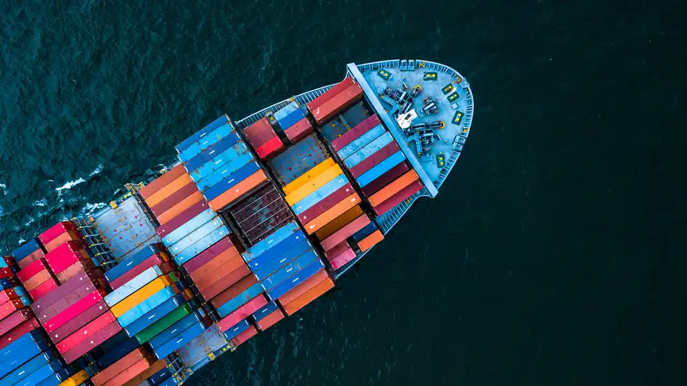 Import export container cargo ship in open sea